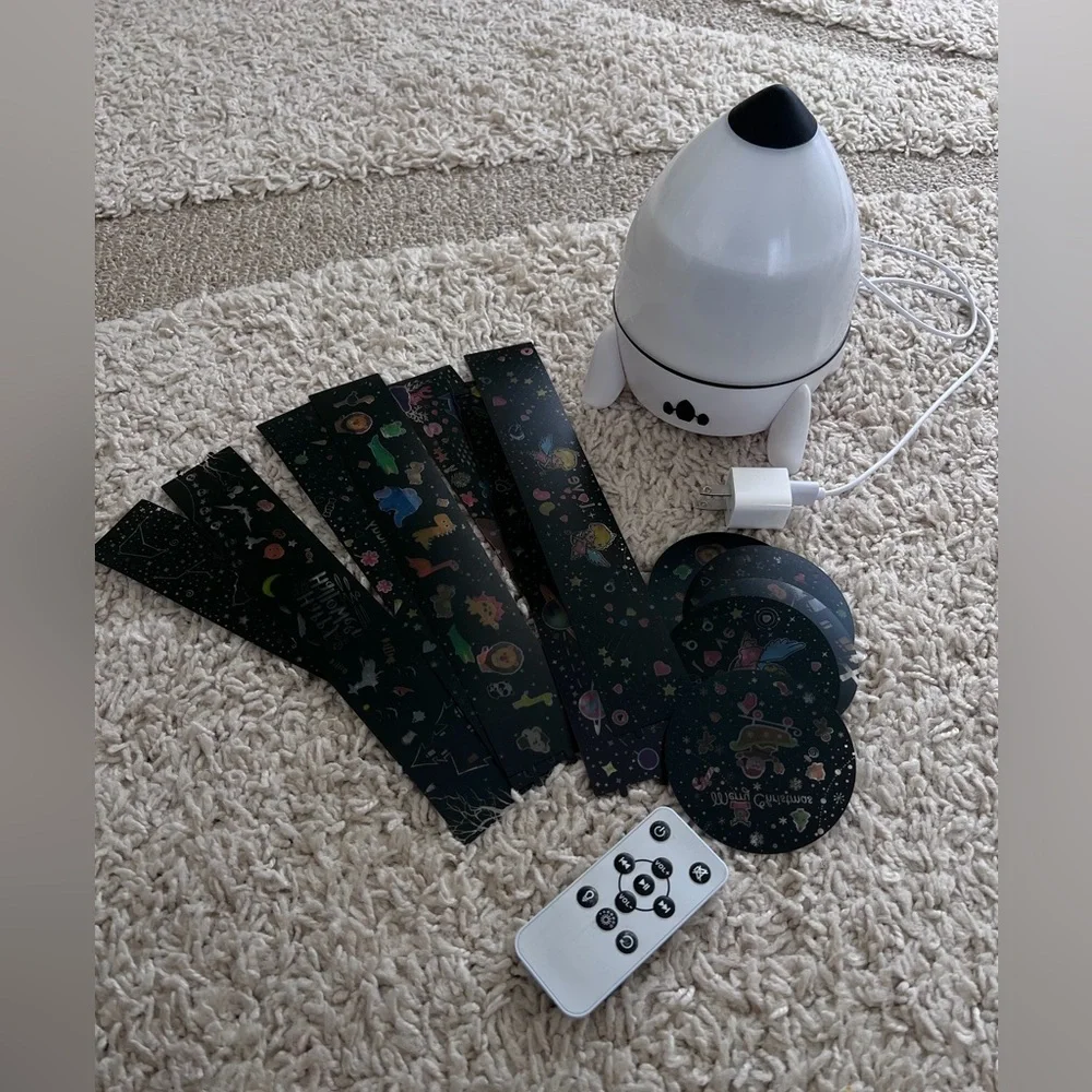 Projector Rocket shaped white and Black with Remote. Kids room